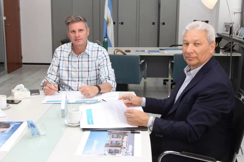 146760_firma-convenio--9-de-34-