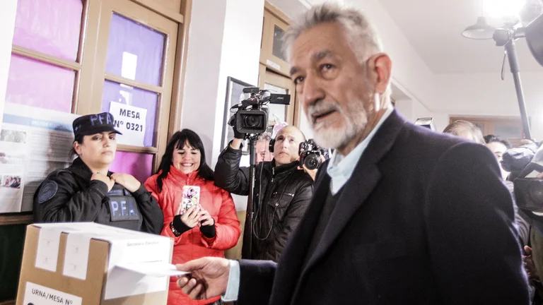 Rodriguez Saa votando
