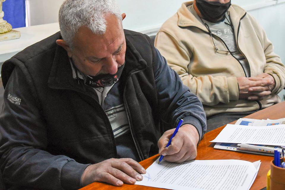 FIRMA CONVENIO CENTRO DE COMERCIO 1